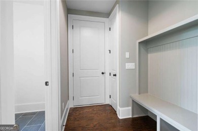 Welcome to this stunning custom-built residence nestled in the on Sunset Hills Country Club in Georgia - for sale on GolfHomes.com, golf home, golf lot