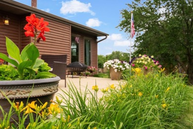 Welcome to your dream home just a block away from the serene on Monroe Country Club in Wisconsin - for sale on GolfHomes.com, golf home, golf lot