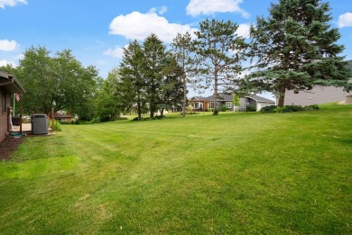 Welcome to your dream home just a block away from the serene on Monroe Country Club in Wisconsin - for sale on GolfHomes.com, golf home, golf lot