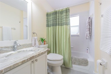An incredibly priced three bedroom, two bath home in the on Tampa Bay Golf and Country Club in Florida - for sale on GolfHomes.com, golf home, golf lot