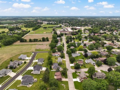 Welcome to your dream home just a block away from the serene on Monroe Country Club in Wisconsin - for sale on GolfHomes.com, golf home, golf lot