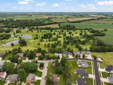 Welcome to your dream home just a block away from the serene on Monroe Country Club in Wisconsin - for sale on GolfHomes.com, golf home, golf lot