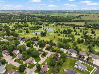 Welcome to your dream home just a block away from the serene on Monroe Country Club in Wisconsin - for sale on GolfHomes.com, golf home, golf lot