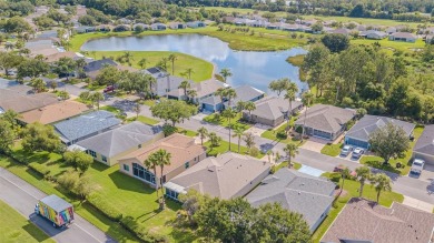 An incredibly priced three bedroom, two bath home in the on Tampa Bay Golf and Country Club in Florida - for sale on GolfHomes.com, golf home, golf lot