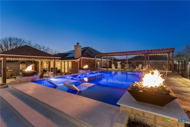 Exquisite golf course estate with resort-style backyard on Wildflower Country Club in Texas - for sale on GolfHomes.com, golf home, golf lot