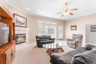 This clean, single-story brick home sits on a large lot and on De Cordova Bend Country Club in Texas - for sale on GolfHomes.com, golf home, golf lot