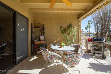 The spacious open floor plan allows you to enjoy the green on London Bridge Golf Course in Arizona - for sale on GolfHomes.com, golf home, golf lot