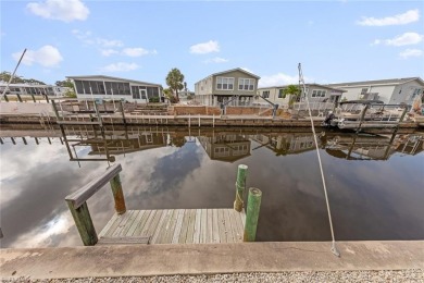 GORGEOUS UPDATES & SOME OF THE BEST DIRECT BOATING ACCESS IN on Pelicans Nest Golf Club in Florida - for sale on GolfHomes.com, golf home, golf lot