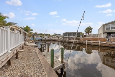 GORGEOUS UPDATES & SOME OF THE BEST DIRECT BOATING ACCESS IN on Pelicans Nest Golf Club in Florida - for sale on GolfHomes.com, golf home, golf lot