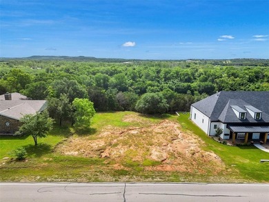 OWN A SLIVER OF THE RIVER IN PECAN PLANTATION GOLFING COMMUNITY! on Pecan Plantation Country Club in Texas - for sale on GolfHomes.com, golf home, golf lot