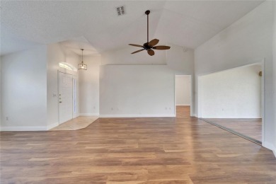 Charming Single-Family Home in Desirable Caloosa Palms II - Sun on Caloosa Greens Executive Golf Course in Florida - for sale on GolfHomes.com, golf home, golf lot