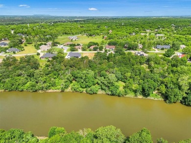 OWN A SLIVER OF THE RIVER IN PECAN PLANTATION GOLFING COMMUNITY! on Pecan Plantation Country Club in Texas - for sale on GolfHomes.com, golf home, golf lot