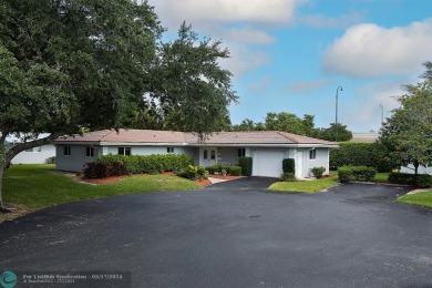 Exquisite home nestled in serene enclave of Plantation, right at on Plantation Preserve Golf Course in Florida - for sale on GolfHomes.com, golf home, golf lot