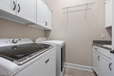 Prestigious Multigenerational Golf-Course Living at Its Finest! on King and Bear Golf Course/World Golf Village in Florida - for sale on GolfHomes.com, golf home, golf lot