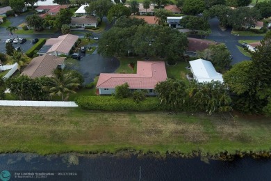 Exquisite home nestled in serene enclave of Plantation, right at on Plantation Preserve Golf Course in Florida - for sale on GolfHomes.com, golf home, golf lot