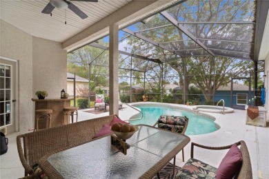 Stunning 2-Bedroom + Den Home with Solar-Heated Pool, Hot Tub on Plantation Golf Club in Florida - for sale on GolfHomes.com, golf home, golf lot