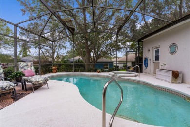 Stunning 2-Bedroom + Den Home with Solar-Heated Pool, Hot Tub on Plantation Golf Club in Florida - for sale on GolfHomes.com, golf home, golf lot