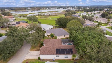 Stunning 2-Bedroom + Den Home with Solar-Heated Pool, Hot Tub on Plantation Golf Club in Florida - for sale on GolfHomes.com, golf home, golf lot