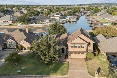 Tucked inside Granbury's beloved Waters Edge community, this on Harbor Lakes Golf Club in Texas - for sale on GolfHomes.com, golf home, golf lot
