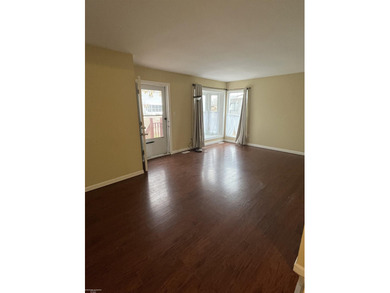 Welcome home to this charming 3-bedroom residence nestled in a on Lake Erie Metropark Golf Course in Michigan - for sale on GolfHomes.com, golf home, golf lot