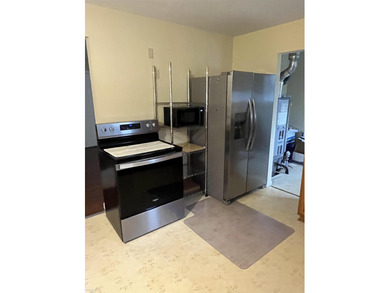 Welcome home to this charming 3-bedroom residence nestled in a on Lake Erie Metropark Golf Course in Michigan - for sale on GolfHomes.com, golf home, golf lot