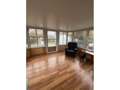 Welcome home to this charming 3-bedroom residence nestled in a on Lake Erie Metropark Golf Course in Michigan - for sale on GolfHomes.com, golf home, golf lot