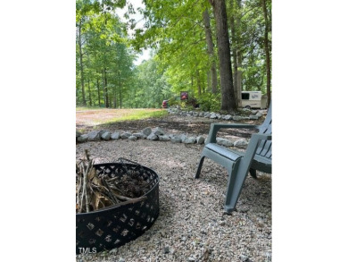 Check out this Affordable Adorable Camper Build over with on River Golf and County Club at Lake Royale in North Carolina - for sale on GolfHomes.com, golf home, golf lot