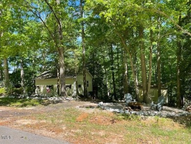 Check out this Affordable Adorable Camper Build over with on River Golf and County Club at Lake Royale in North Carolina - for sale on GolfHomes.com, golf home, golf lot