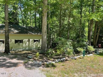Check out this Affordable Adorable Camper Build over with on River Golf and County Club at Lake Royale in North Carolina - for sale on GolfHomes.com, golf home, golf lot