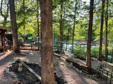 Check out this Affordable Adorable Camper Build over with on River Golf and County Club at Lake Royale in North Carolina - for sale on GolfHomes.com, golf home, golf lot