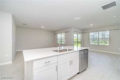 Picture this: a spacious lot with a stunning view of a wooded on Herons Glen Golf and Country Club in Florida - for sale on GolfHomes.com, golf home, golf lot