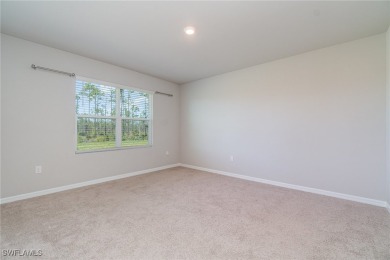 Picture this: a spacious lot with a stunning view of a wooded on Herons Glen Golf and Country Club in Florida - for sale on GolfHomes.com, golf home, golf lot