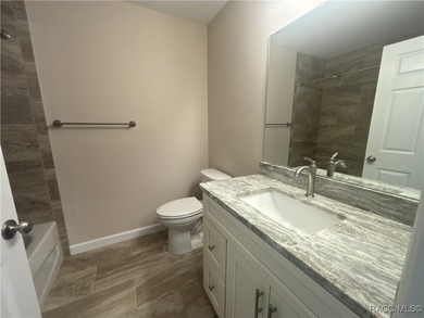 Charming New Construction in Citrus Springs - The Mini Pure on Citrus Springs Country Club in Florida - for sale on GolfHomes.com, golf home, golf lot