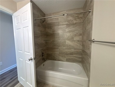 Charming New Construction in Citrus Springs - The Mini Pure on Citrus Springs Country Club in Florida - for sale on GolfHomes.com, golf home, golf lot