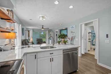 Spacious 2 bedroom 2 bath condo in the gated community of on River Oaks Golf Plantation  in South Carolina - for sale on GolfHomes.com, golf home, golf lot