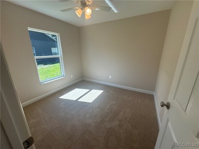 Charming New Construction in Citrus Springs - The Mini Pure on Citrus Springs Country Club in Florida - for sale on GolfHomes.com, golf home, golf lot