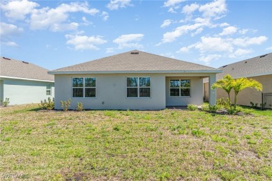 Picture this: a spacious lot with a stunning view of a wooded on Herons Glen Golf and Country Club in Florida - for sale on GolfHomes.com, golf home, golf lot