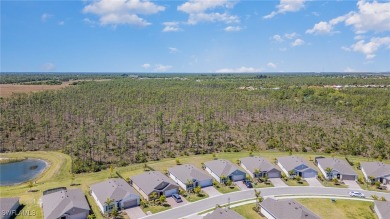 Picture this: a spacious lot with a stunning view of a wooded on Herons Glen Golf and Country Club in Florida - for sale on GolfHomes.com, golf home, golf lot