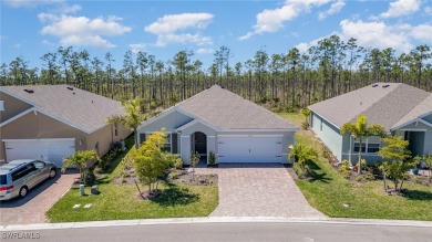 Picture this: a spacious lot with a stunning view of a wooded on Herons Glen Golf and Country Club in Florida - for sale on GolfHomes.com, golf home, golf lot