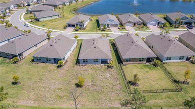 Picture this: a spacious lot with a stunning view of a wooded on Herons Glen Golf and Country Club in Florida - for sale on GolfHomes.com, golf home, golf lot