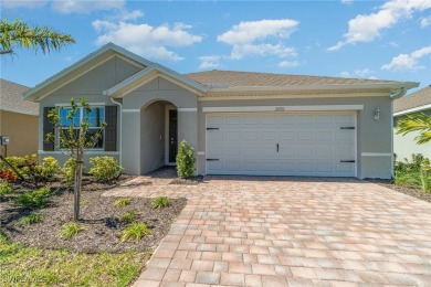 Picture this: a spacious lot with a stunning view of a wooded on Herons Glen Golf and Country Club in Florida - for sale on GolfHomes.com, golf home, golf lot