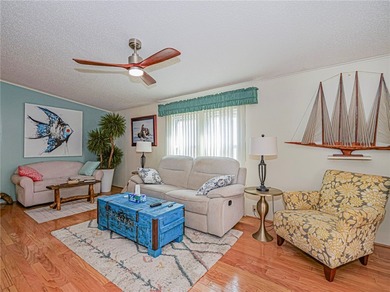 Clean! Fresh updates New Appliances, New AC, Ceiling fans, paint on Barefoot Bay Golf Course in Florida - for sale on GolfHomes.com, golf home, golf lot