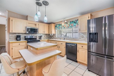 Bright and Beautiful!Welcome to this spacious 1,620 SF 3 bed, 2 on Betmar Acres Golf Club in Florida - for sale on GolfHomes.com, golf home, golf lot