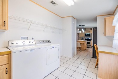 Bright and Beautiful!Welcome to this spacious 1,620 SF 3 bed, 2 on Betmar Acres Golf Club in Florida - for sale on GolfHomes.com, golf home, golf lot