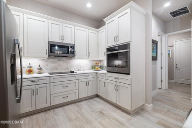 Welcome to this stunning, meticulously upgraded home in the on Plantation Bay Golf and Country Club in Florida - for sale on GolfHomes.com, golf home, golf lot