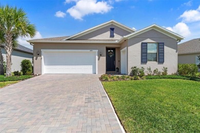 Under contract-accepting backup offers. Stunning three-bedroom on Stonecrest Golf and Club Club in Florida - for sale on GolfHomes.com, golf home, golf lot