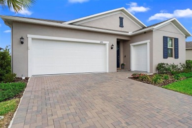 Under contract-accepting backup offers. Stunning three-bedroom on Stonecrest Golf and Club Club in Florida - for sale on GolfHomes.com, golf home, golf lot
