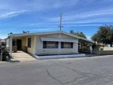 Spacious 2 bedroom with Fruit trees and a large yard. Located in on Colonial Country Club in California - for sale on GolfHomes.com, golf home, golf lot