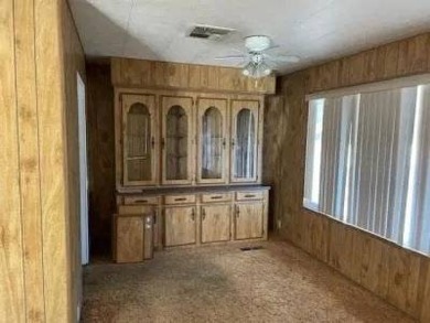 Spacious 2 bedroom with Fruit trees and a large yard. Located in on Colonial Country Club in California - for sale on GolfHomes.com, golf home, golf lot