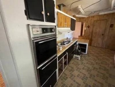 Spacious 2 bedroom with Fruit trees and a large yard. Located in on Colonial Country Club in California - for sale on GolfHomes.com, golf home, golf lot